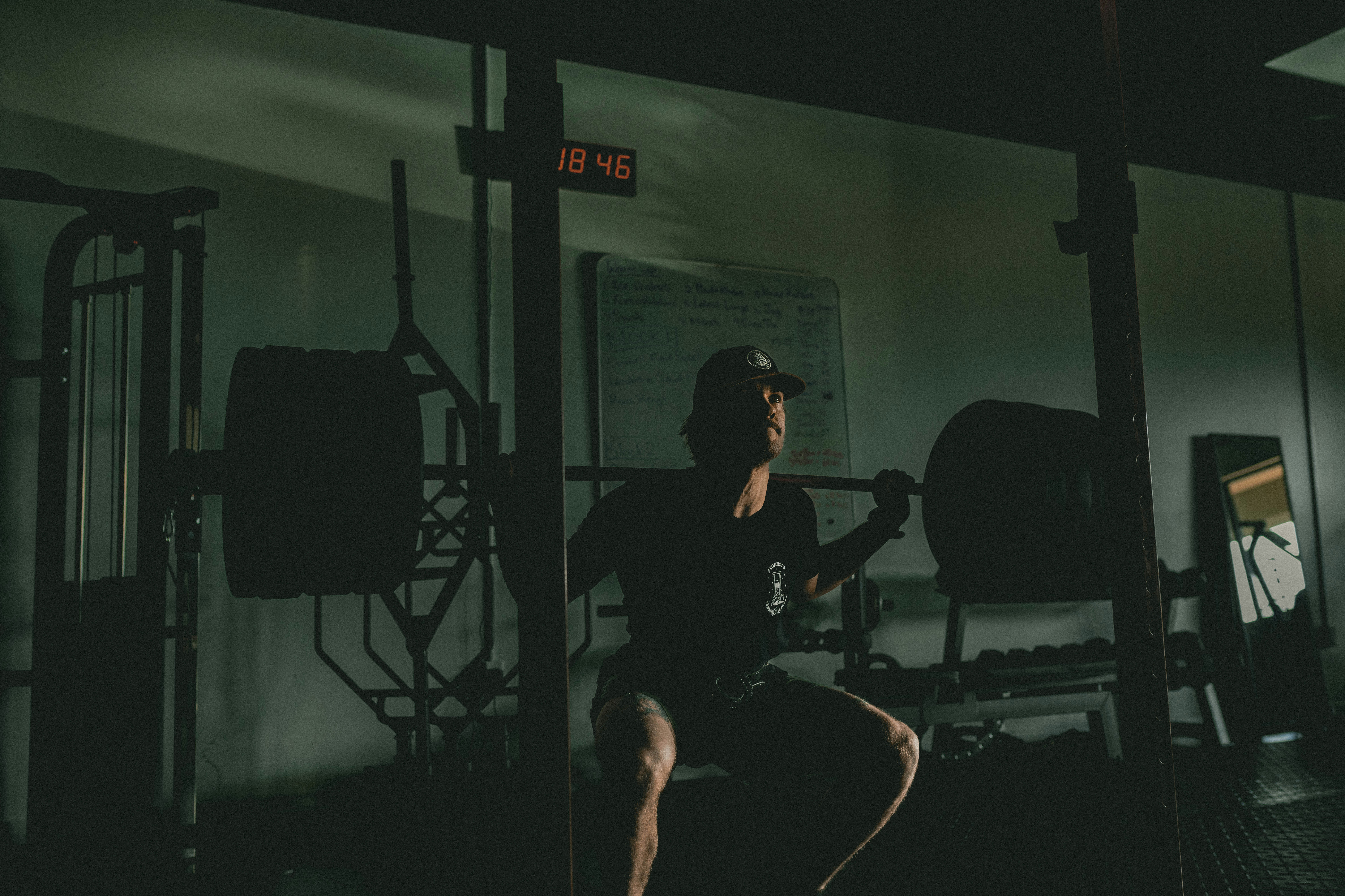 Man rebuilding through gym discipline.