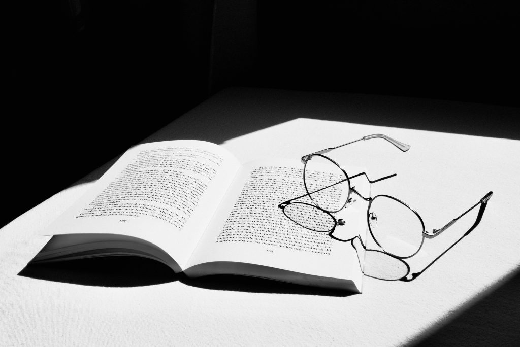 Notebook on table representing self-discipline plan.