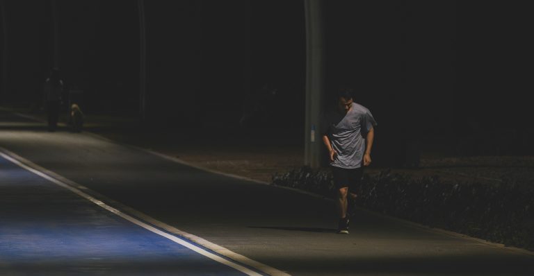 Man developing a powerful gym mindset during early morning training.