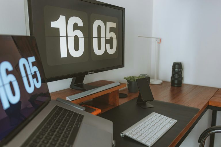 Minimalist morning routine setup on desk with time and focus tools.
