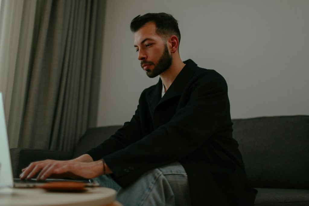 Man practicing deep work with a session timer, building mental discipline like a warrior.