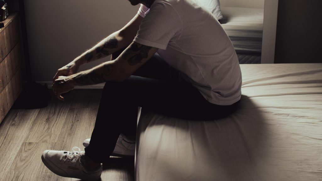 Modern man lost in comfort and distraction.