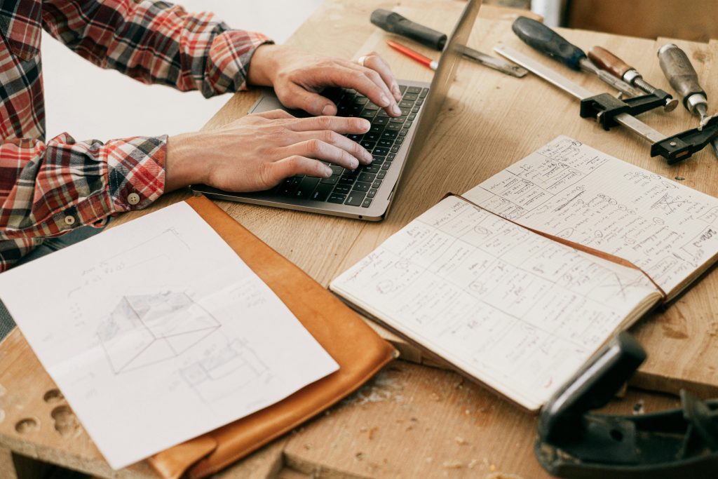 Man producing high-output work through sustained focus and flow state.