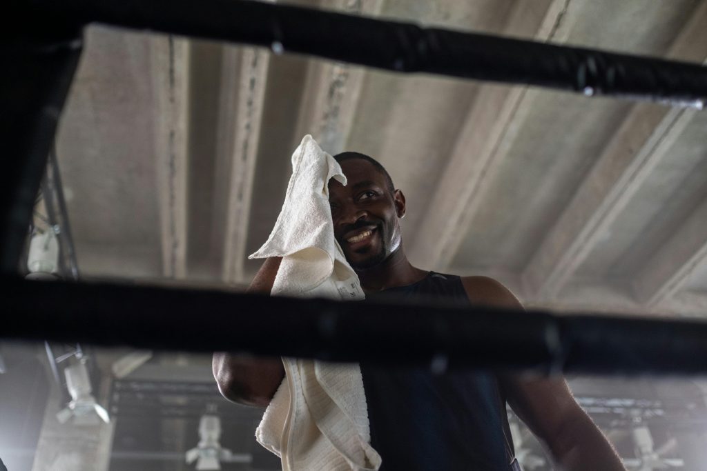 A man being proud of himself after finishing a workout.