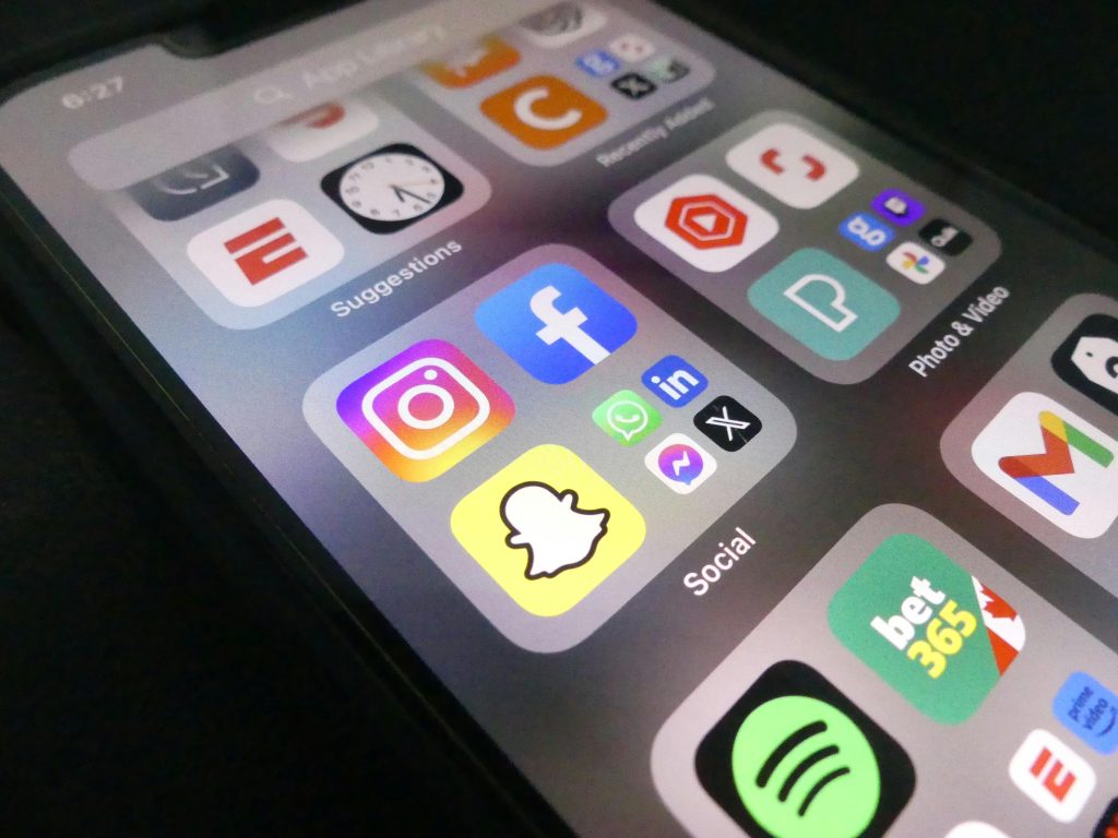 Surrounded by digital notifications and phone apps.