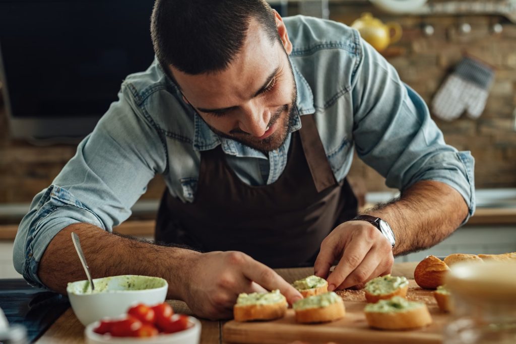 Man eating clean food alone—symbol of food discipline and self-mastery.